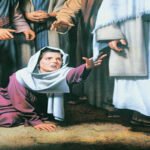figura da mulher tocando nas vestes de Jesus